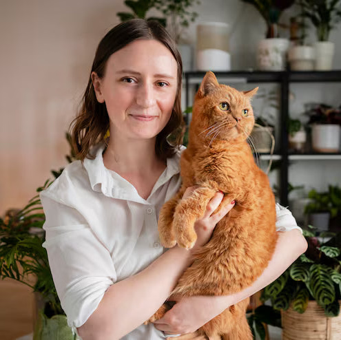 files/woman-growing-plants-home-holding-cat_23-2148928467.avif